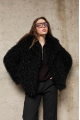 Short women's fur coat made of black ECO llama